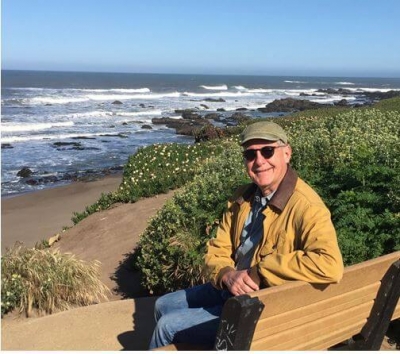 John on a Beach Bench