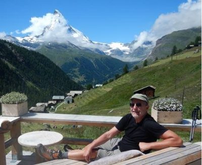 John on Deck Overlooking Alps